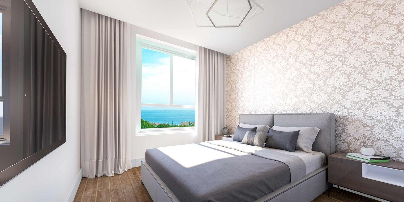 Sovrum med havsutsikt i lägenhet Residencial Pacaraima